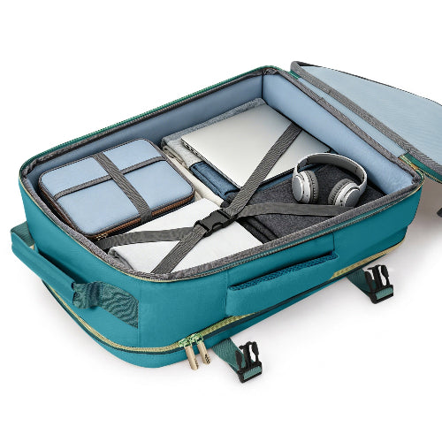 Open teal suitcase with organized contents on a white background
