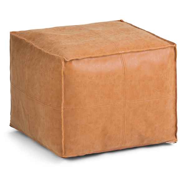 Brown leather cube ottoman on a white background