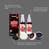 A fake blood makeup kit displayed on a dark gray background with explanatory text callouts. The kit includes a black box, two small bottles labeled Blood Spray and Blood Works, a white sponge, a round makeup sponge, a small jar of dark fake blood, and a round lid, all arranged neatly.