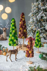 Christmas tree table decor in a winter display with deer