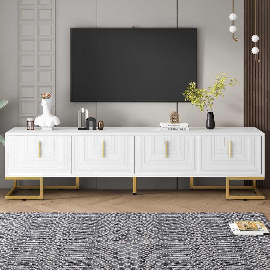 Contemporary entertainment center with sleek white finish, gold handles, and ample storage for media devices and decor.