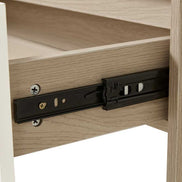Close-up of the drawer slide mechanism on the shoe storage bench, showing durable metal rails for smooth operation.