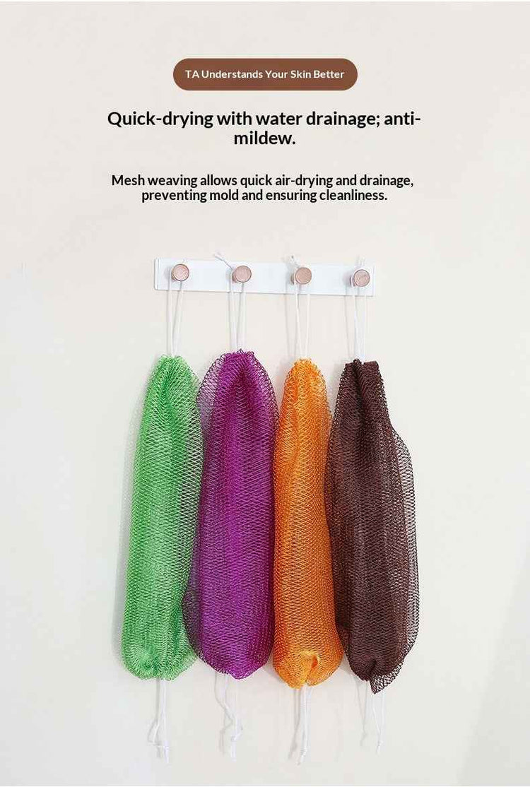 Four reusable mesh laundry bags in green, purple, orange, and brown hanging from a white rack against a light beige wall, with product feature text above.