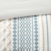 Textile with blue geometric pattern on a white background