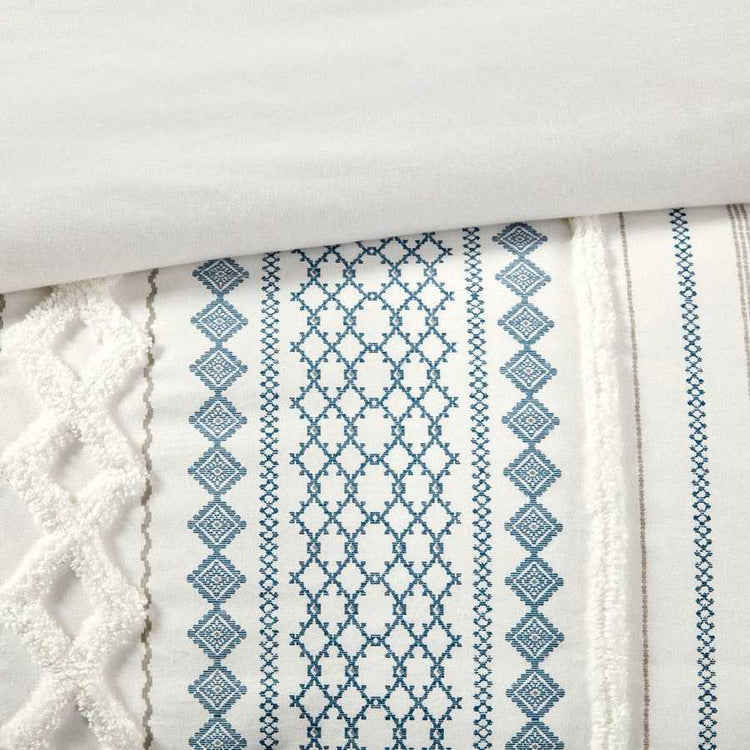 Textile with blue geometric pattern on a white background