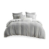 Gray textured comforter set with matching pillows on a white background