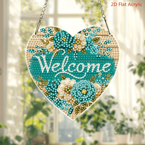 Heart-shaped acrylic sun catcher with floral design and 'Welcome' text