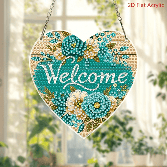 Heart-shaped acrylic sun catcher with floral design and 'Welcome' text