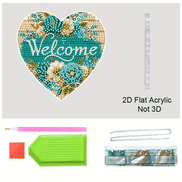 Close-up of heart-shaped acrylic sun catcher with crafting tools