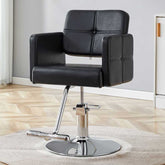 Close-up of black salon chair with chrome base