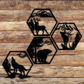 Rustic Iron Hexagon Wall Art Set mounted on wooden wall, 4-piece forest animal design with bear, deer, elk, and wolf silhouettes for cabin or lodge decor.