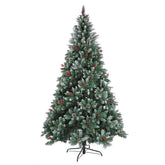 A pre-lit artificial Christmas tree with a flocked white finish, decorated with small pinecones and red berries, standing on a black metal stand against a plain white background.