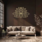 Iron Mandala Wall Art in gold above a beige sofa in a cozy living room. Blends intricate lotus design with warm, zen-inspired decor.