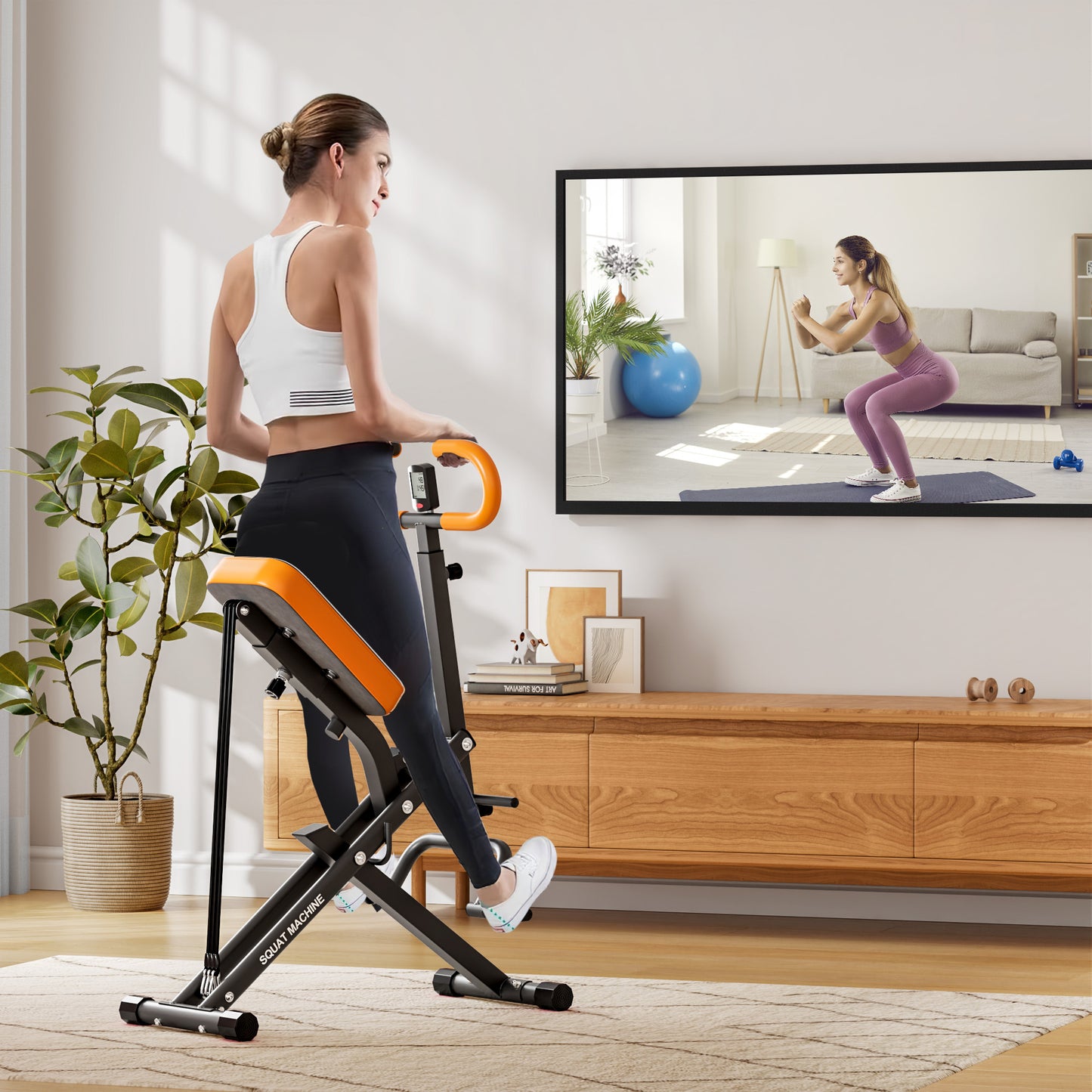 Woman using Squat Machine Home - Adjustable Resistance for Full Body Fitness while following a virtual workout in a modern living room.