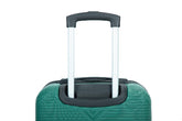 Close-up of a green hard-shell rolling suitcase with the telescoping handle extended, showing the dark gray handle grip and black trim against a white background.