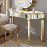 Half-Moon Mirrored Console Table used as a vanity in a bedroom setting, paired with a gold chair and makeup accessories.