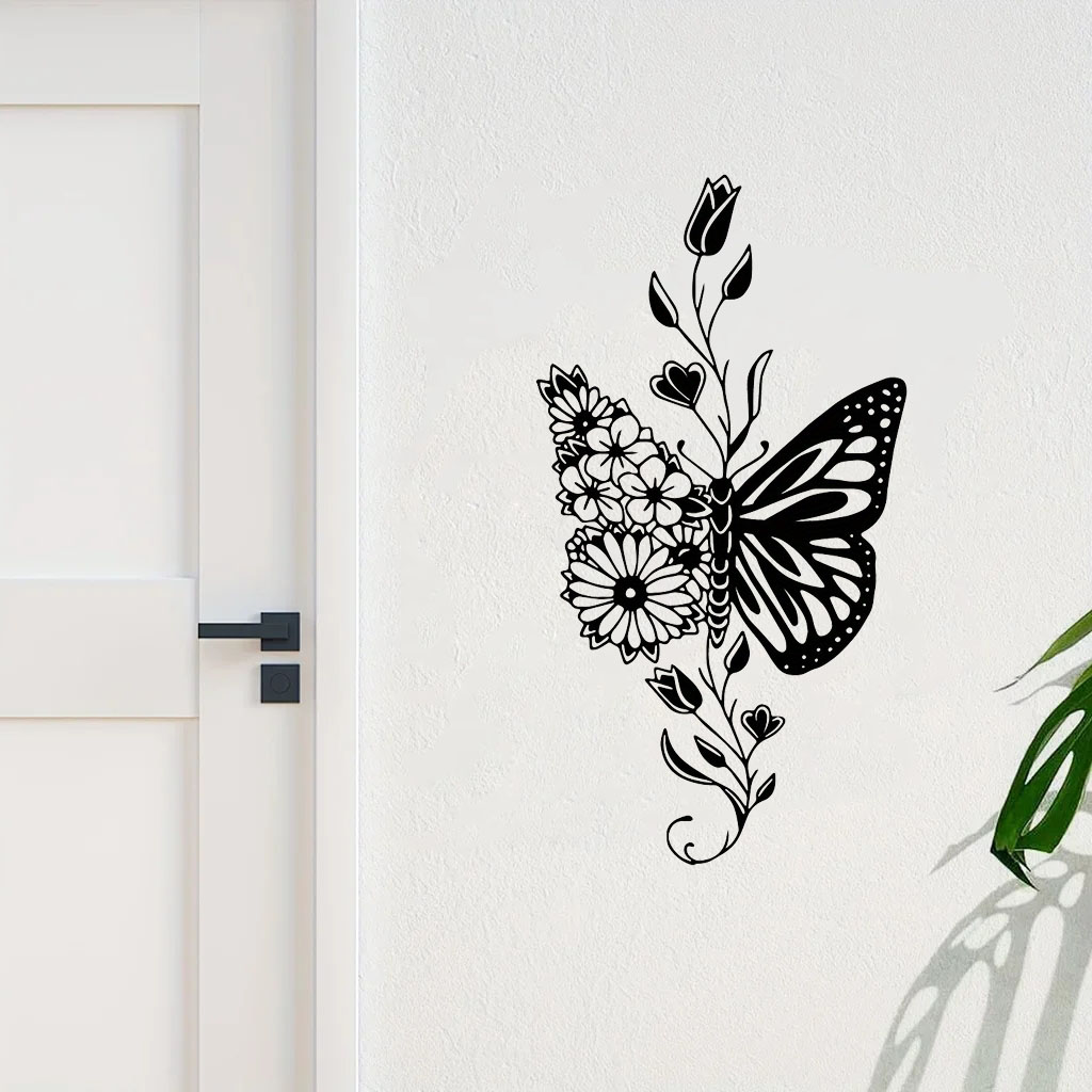 Aluminum butterfly wall art with floral accents mounted near a white door, adding rustic charm to entryway decor.