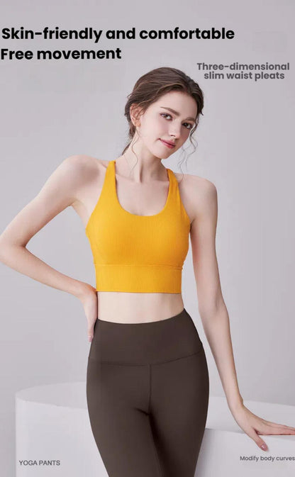 Skin-friendly Yoga Clothes Top - Slim Fit in yellow, featuring three-dimensional waist pleats for comfort and free movement in activewear.