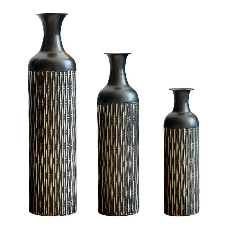 Three black metal floor vases with slim necks and textured bodies, ideal for modern home decor and interior styling.