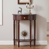 A dark brown wooden console table with a single drawer, turned legs, and a lower shelf featuring a sunburst metal ornament. The table is styled with a bronze deer figurine and a brass candelabra against a neutral wall.