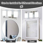 A bathroom vanity light fixture shown in two installation directions: mounted above a round mirror labeled &