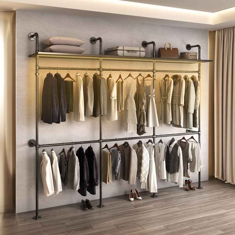 Close-up of black industrial pipe fittings used in the heavy-duty clothing rack, durable metal construction for stability