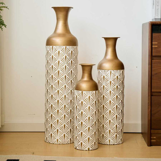 Set of 3 metal floor vases with gold tops and white patterned bodies, ideal for elegant home decor in living rooms or entryways.