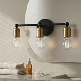 Bathroom vanity light fixture with three bulbs on a mirror background