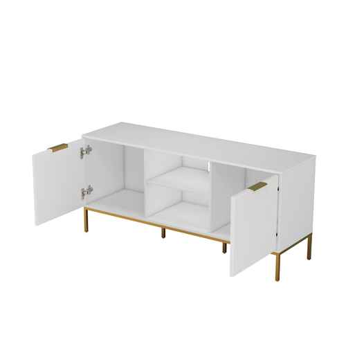 White TV stand with wave-design doors, gold handles, and gold legs, featuring open storage and a mounted TV on a blue wall.