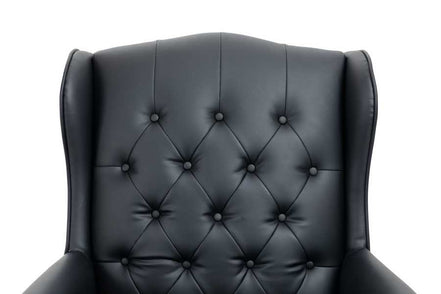 Black leather armchair with tufted backrest on a white background