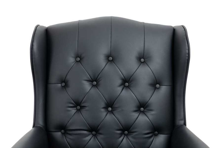 Black leather armchair with tufted backrest on a white background