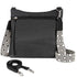 Black handbag with a patterned strap on a white background