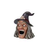 Front view of Halloween witch decoration with glowing eyes, open mouth, gray hair, black hat with skull, Halloween party setup