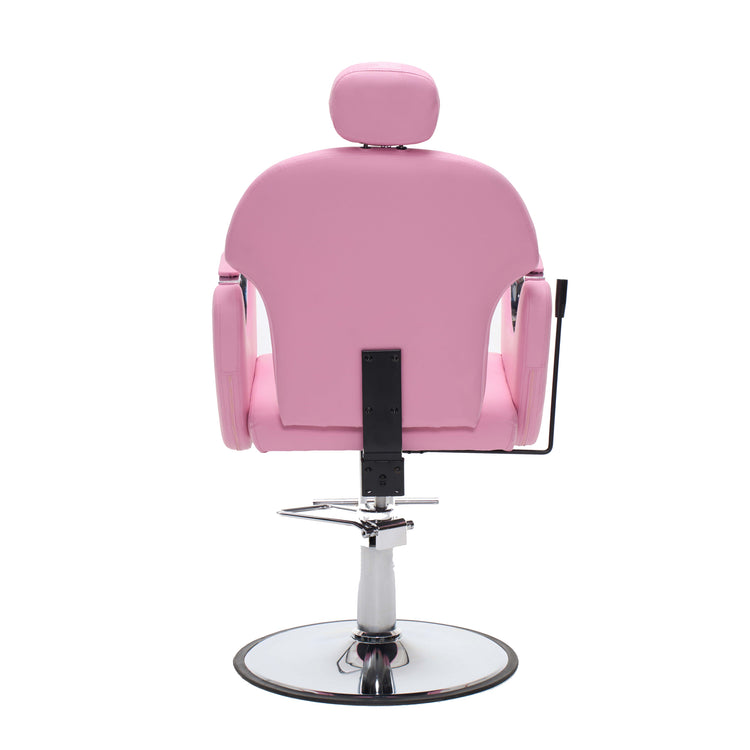 A pink salon barber chair with a matching headrest, upholstered in smooth pink vinyl, mounted on a chrome hydraulic lift base with a circular footplate.