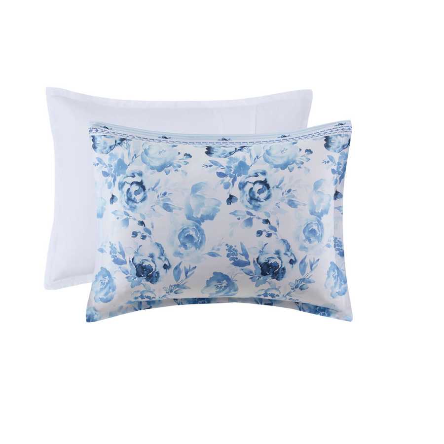 Close-up of floral and white pillow shams from the Twin Floral Striped Duvet Cover Set - Twin Duvet Cover Set Floral, featuring blue rose patterns.