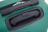 Close-up of a green hard-shell suitcase showing the telescoping handle, black plastic handle surround, zipper pull, and textured exterior surface.