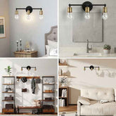 Bathroom vanity light fixture with three bulbs on a mirror background