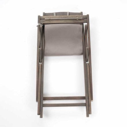Wooden chair with a gray cushion on a white background