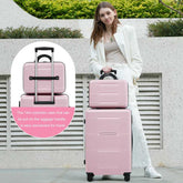Woman holding a pink suitcase with a cosmetic case attached, standing outdoors.