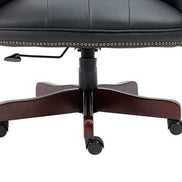 Black office chair with wooden base on a white background