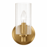Gold wall sconce with clear glass shade on a white background