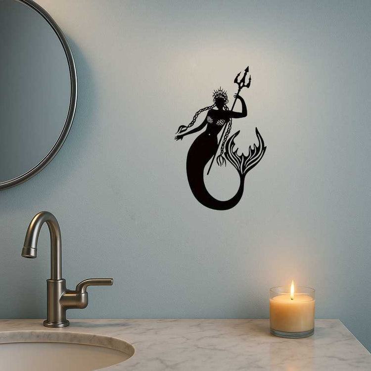 Mermaid Sea King Iron Relief Art beside round mirror and candle on bathroom wall, a unique handcrafted coastal wall sculpture.