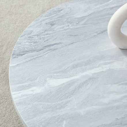 Close-up of the marble-look tabletop on the MDF white round coffee table, emphasizing its modern and elegant surface.