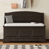 Dark wooden bench with white cushion and checkered pillow in a room setting.