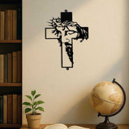 Metal Cross Wall Art Decor featuring Jesus face silhouette in a study room. Durable and meaningful metal wall piece for indoor decor.