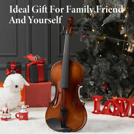 Wooden violin with Christmas decorations