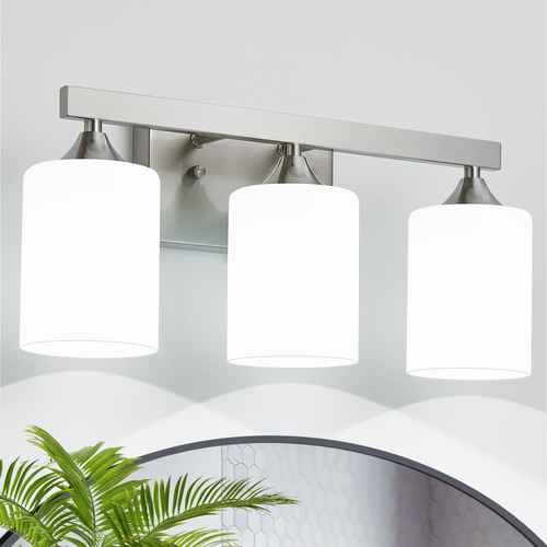Three-light fixture with white glass shades on a neutral background
