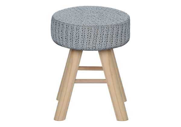 Stool with a textured gray cushioned top and wooden legs on a white background