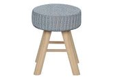Stool with a textured gray cushioned top and wooden legs on a white background