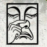 Funny Nose Picking Expression Wall Art in black iron on concrete wall, perfect for quirky home decor or game room accent.